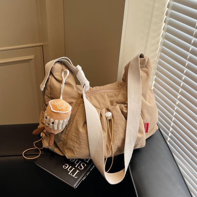Bag women's large-capacity new simple and versatile pleated shoulder messenger bag class tote bag