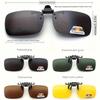 A pair of stylish four-piece flip-on polarized night vision sunglasses with an anti-glare mirror coating, ideal for driving.