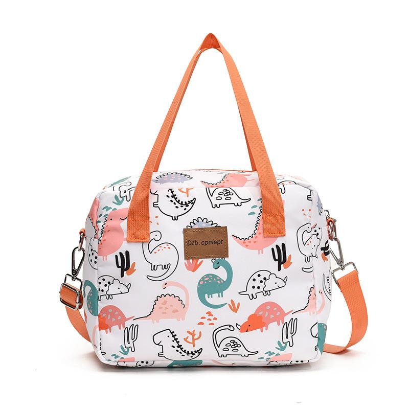 Single-shoulder slanted crossbody baby bag, cute cartoon design, large capacity, water-resistant, suitable for moms to carry out