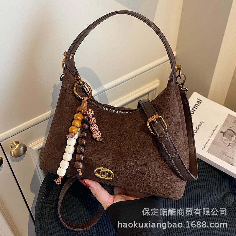 Premium sense niche bag women's autumn and winter retro 2025 new leopard print shoulder messenger bag frosted portable dumpling bag