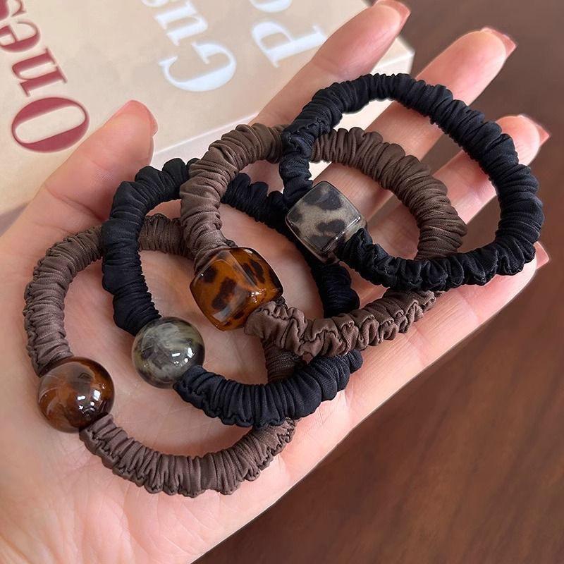 Elastyczna gumka do włosów z perłami i nadrukiem pantery - Wytrzymały i stylowy uchwyt do kucyka