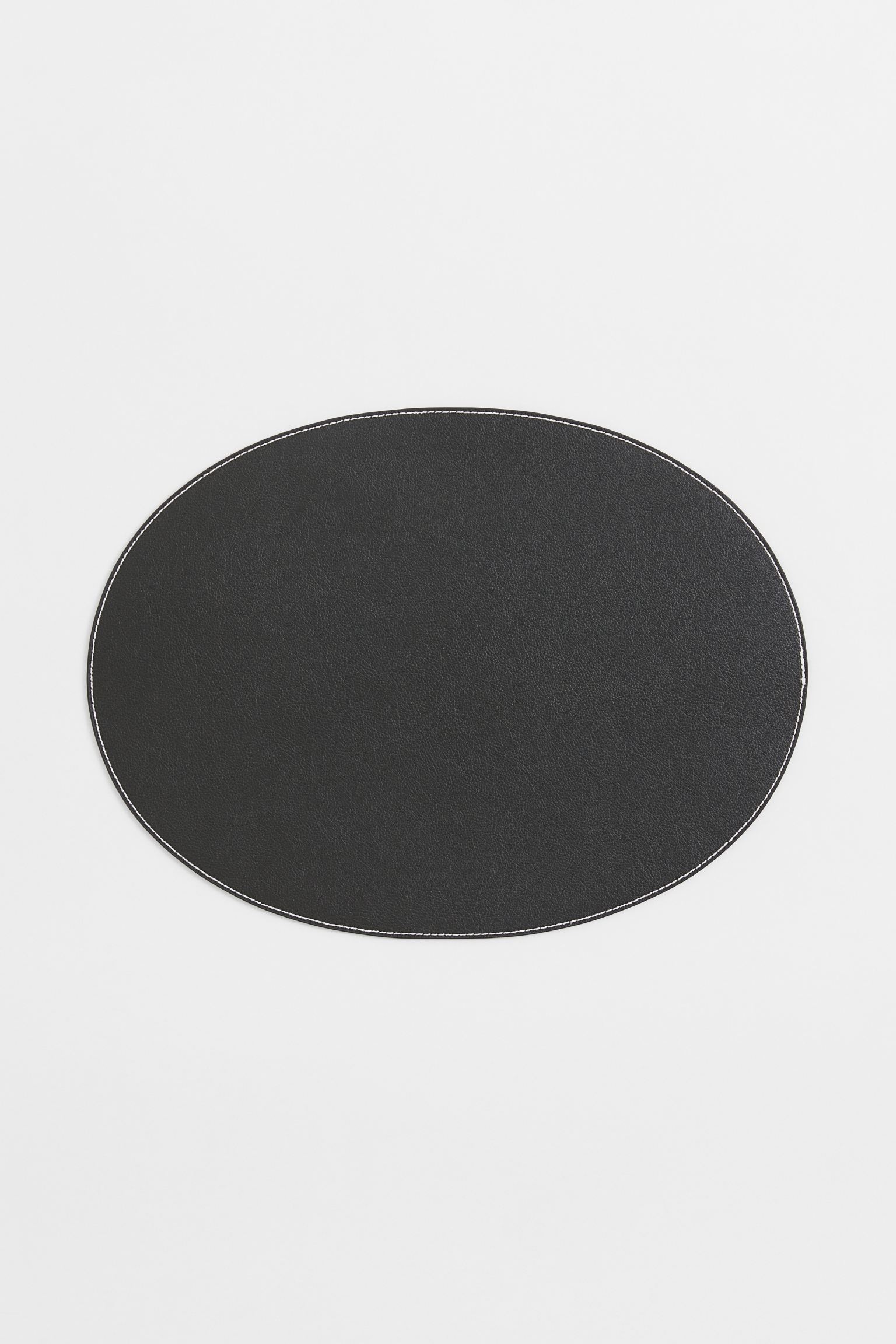 

Oval table mat
