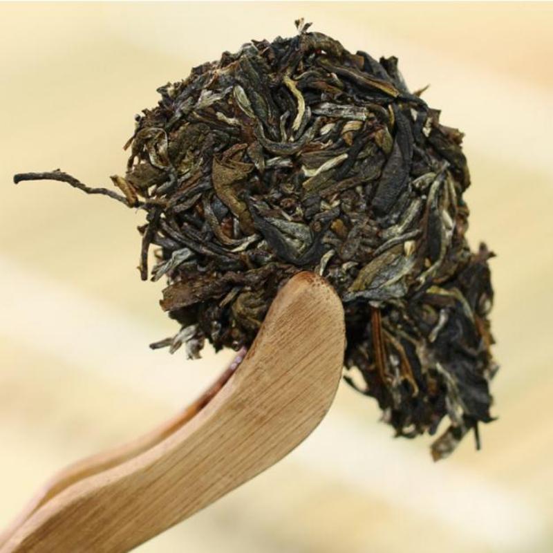 357g Pu-erh Roher Tee Kunlushan Puerh Tee Yunnan Alter Baum Pu'er Grüner Tee Vorteile