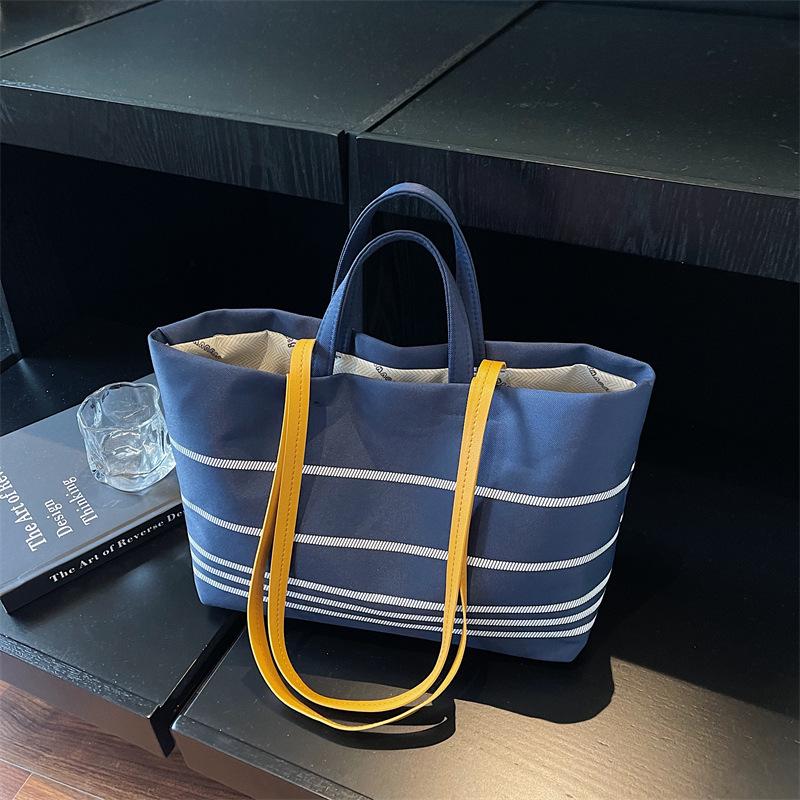 

Женская полосатая холщовая сумка через плечо - Модный стиль 2025, Оригинальный дизайн, Повседневная сумка кроссбоди 38cm x 12cm x 23cm синий