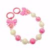 Handmade candy-colored bow bead pendant phone case chain for female students - beaded hand-held jewelry and bag accessory.
