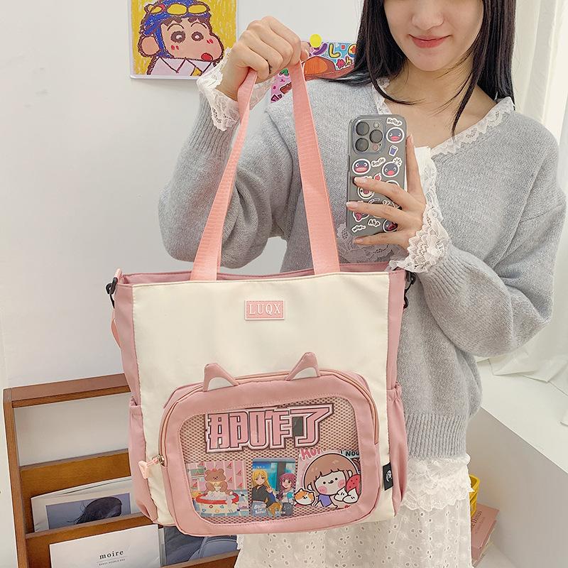 Urocza kosmetyczka w stylu college'owym, torebka 2025 nowa dziewczęca zaawansowana torba na ból, duża pojemność, torba tote na dojazdy