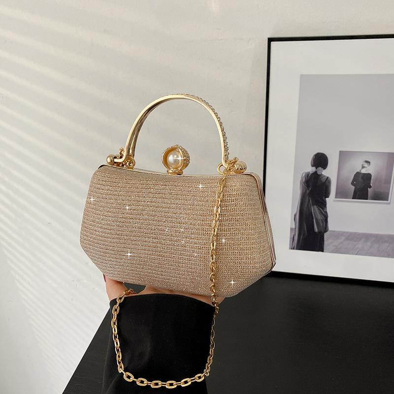 

Bag women s bag 2025 new one-shoulder European and American fashion rhinestone retro ins foreign style portable messenger dinner bag tide рожевий