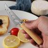 Stainless Steel Cheese Tools Set with Rubber Wood Handle, Including Cheese Knife, Slicer, Butter Knife, and Fork.