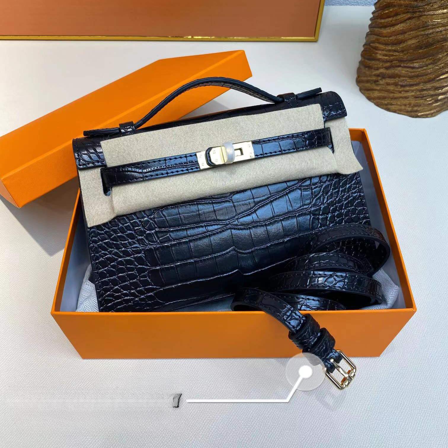 

Оптовая продажа нового поколения простой маленькой квадратной сумки через плечо, с косым ремнем, портативной, из первого слоя коровьей кожи, женской сумки, с отстрочкой 22x7x13cm