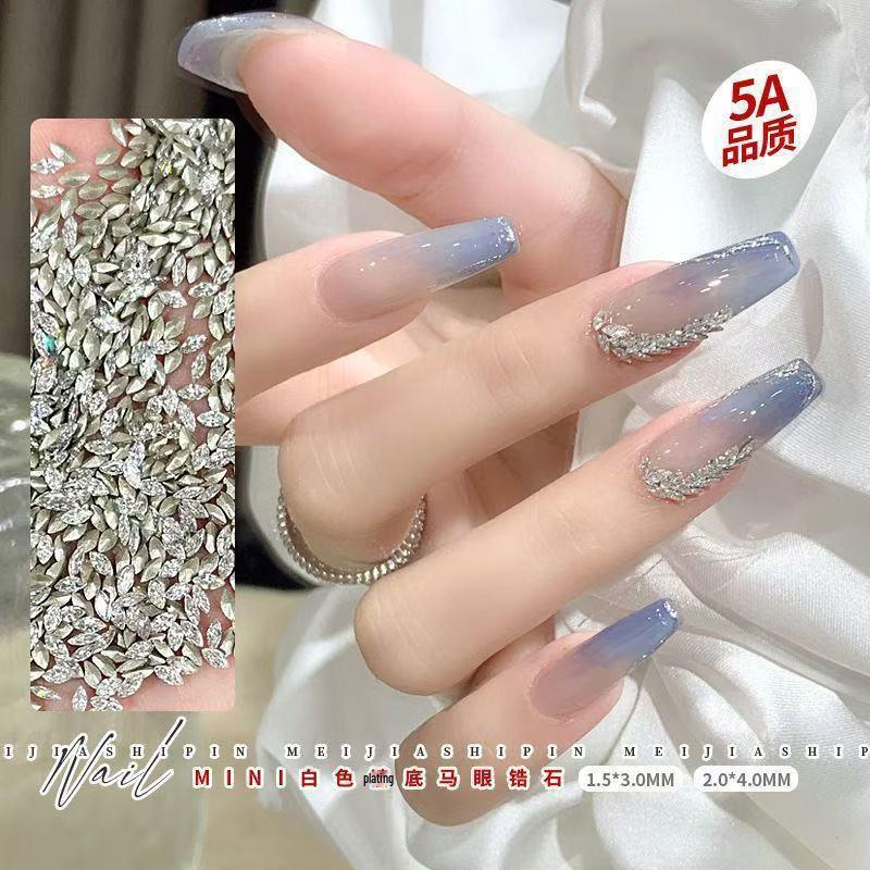 

Неправильной формы белые цирконы 3D стразы для нейл-арта: Супер Блестящий Смешанный Гламур White Zircon Navette (2x4)