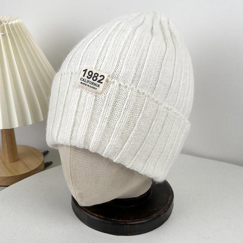 Winter Warm Wool Hat Women's Outdoor Ear Protection Labeling Knitted Cold Hat Student Cycling Morning Running Windproof Pullover Hat
