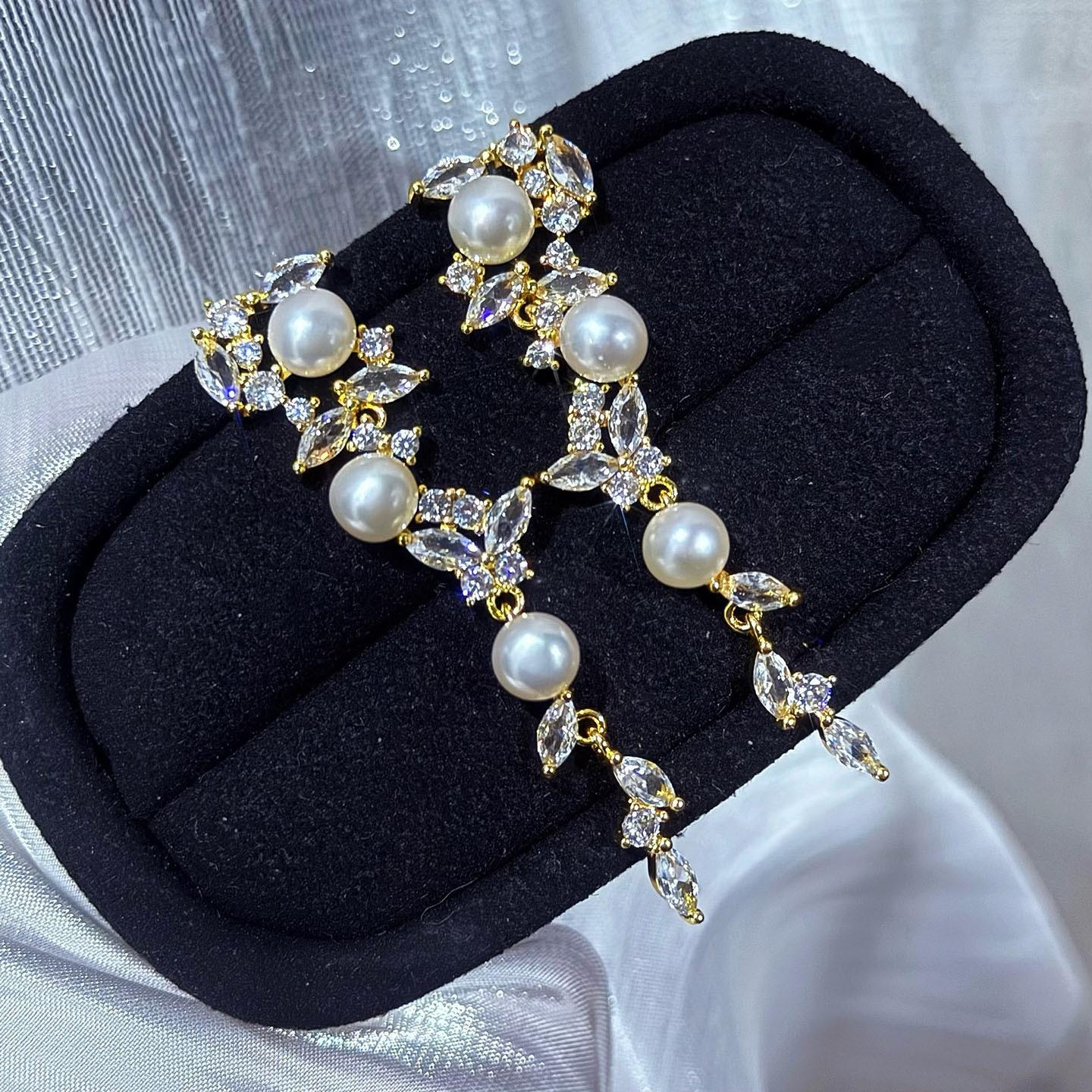 Natural Freshwater Pearl Earrings Women s S925 Silver Needle Zircon Tassel Niche High-end Multi-bead Long Pearl Earrings 2026