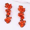 Bohemian fashion and elegance contrasting color metal flower pendant earrings light luxury versatile daily wear women