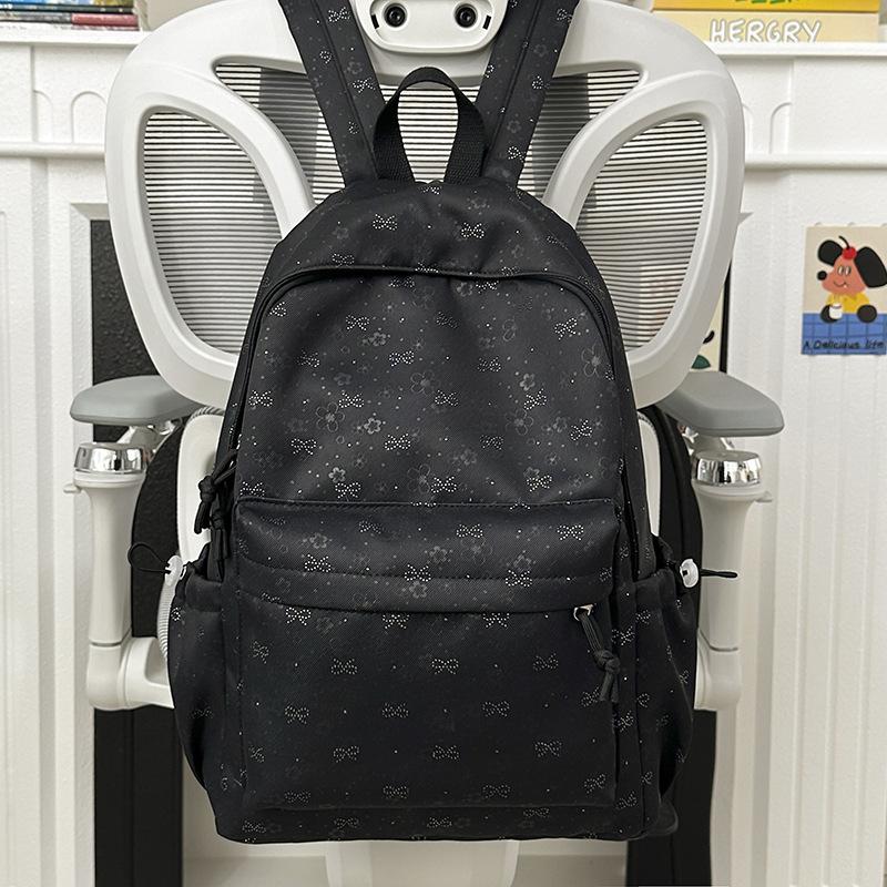 Schoolbag High value niche schoolbag Female college student lightweight backpack Junior high school student bow large capacity backpack