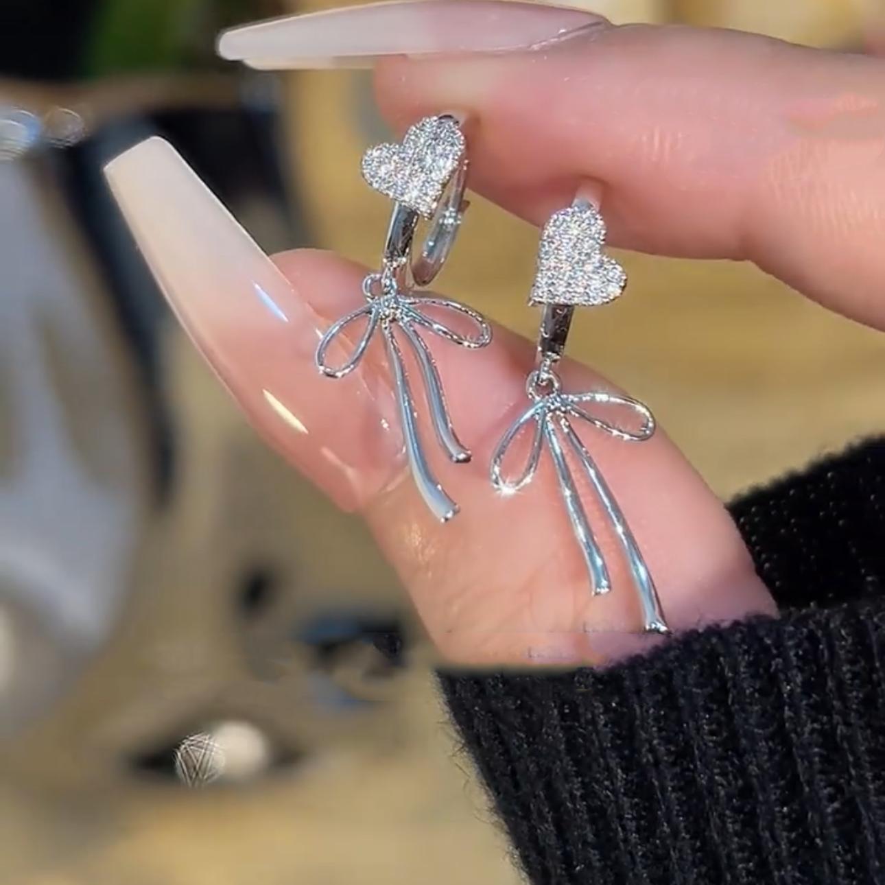 

Zircon love bow fringed ear buckle niche design exquisite earrings light luxury high-end versatile earrings