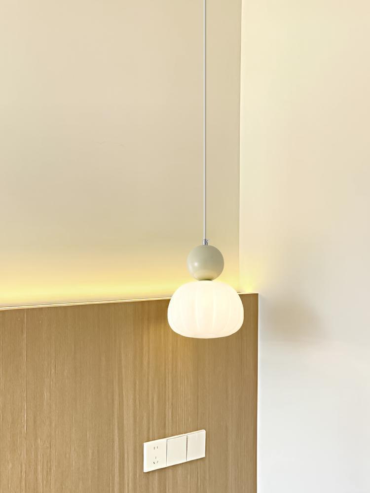 Cream Style Pumpkin Pendant Light: Modern Minimalist Bedside Lamp for Master Bedroom, Bar Counter, or Foyer with Single Head Cord Suspension.