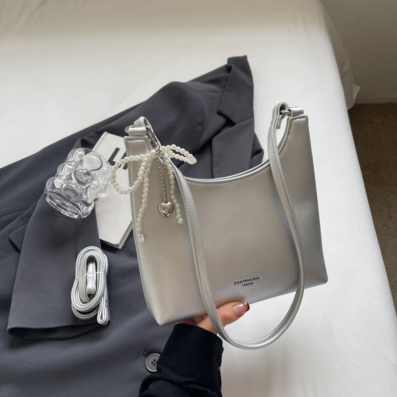 

Женская сумка новая, нишевый багет высокого чувства. серебряный