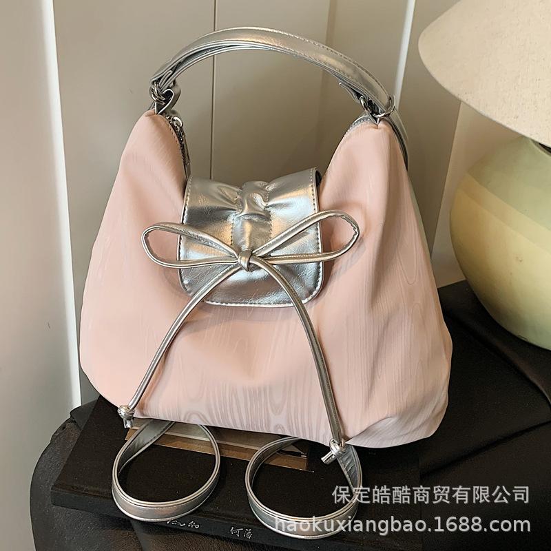 

Casual large-capacity contrasting bag, women s 2025 new versatile shoulder bag, backpack, commuter bucket bag синий