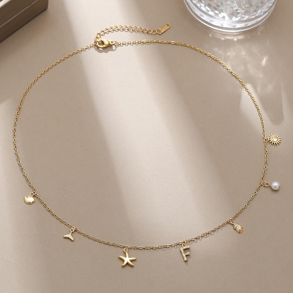 Einfache und modische Goldbuchstaben-Serie Meereskreaturen-Dekorationskette