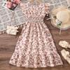 Sommer Kinder Kurzarm Urlaubsstil Kleid mit Blumendruck für Mädchenmode
