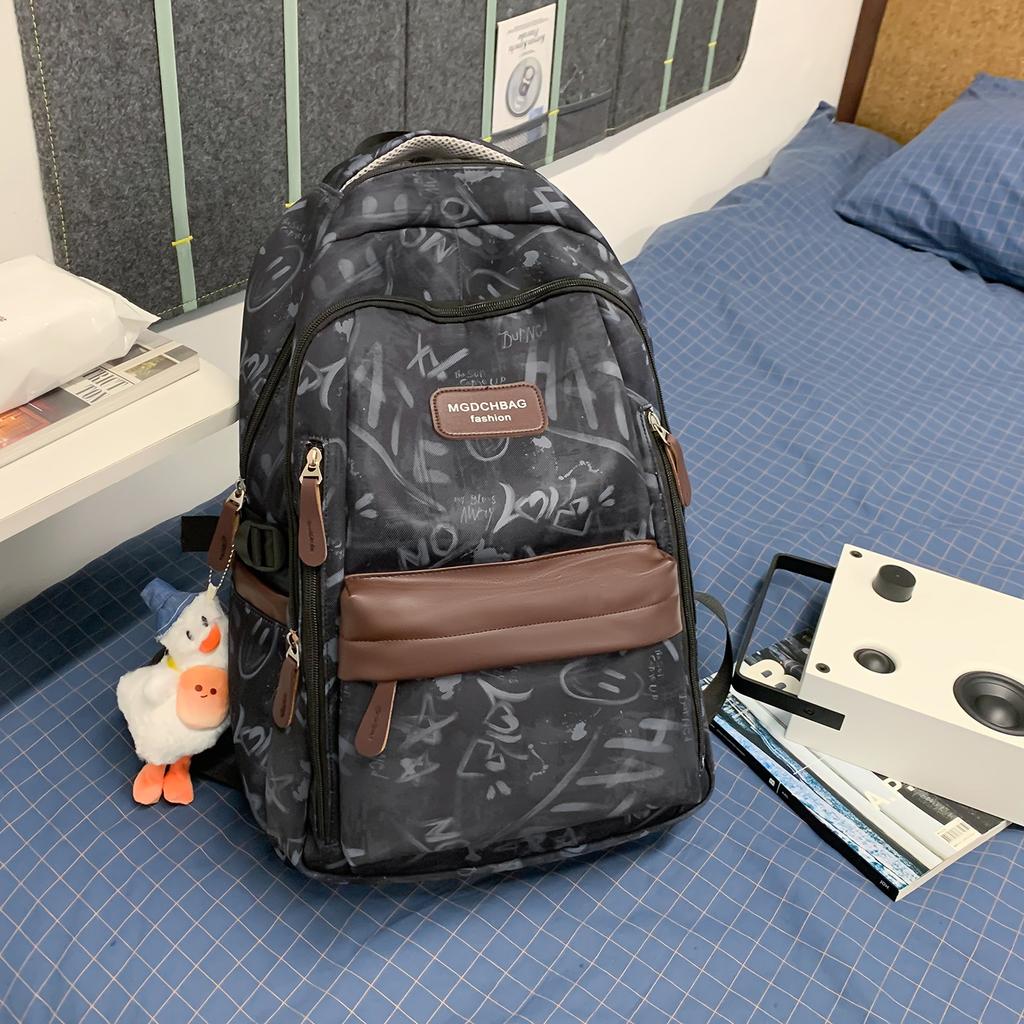 Schoolbag new graffiti niche schoolbag male junior high school student high school student lightweight backpack college student large capacity