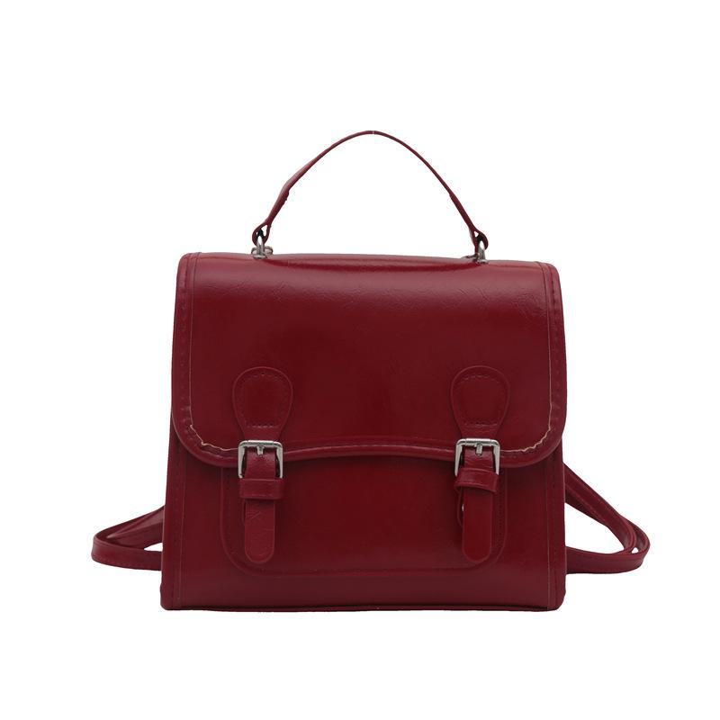 

Текстурований жіночий рюкзак 2024 року в корейській версії ins мода в стилі коледжу, портфель, ніша, проста жіноча сумка зі скошеним розмахом червоний