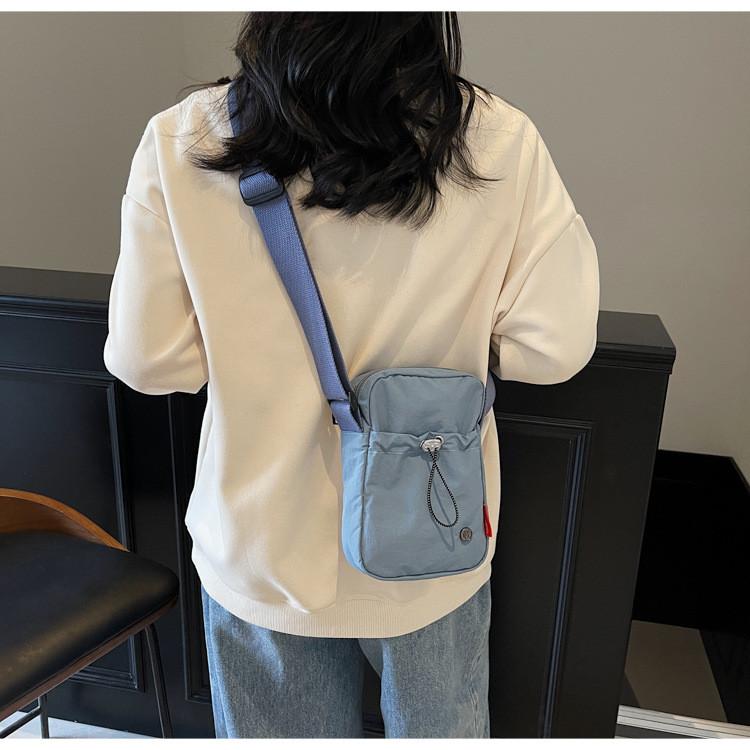 Mini Crossbody Bag For Women With Nylon Material And Zipper Closure For Daily Use