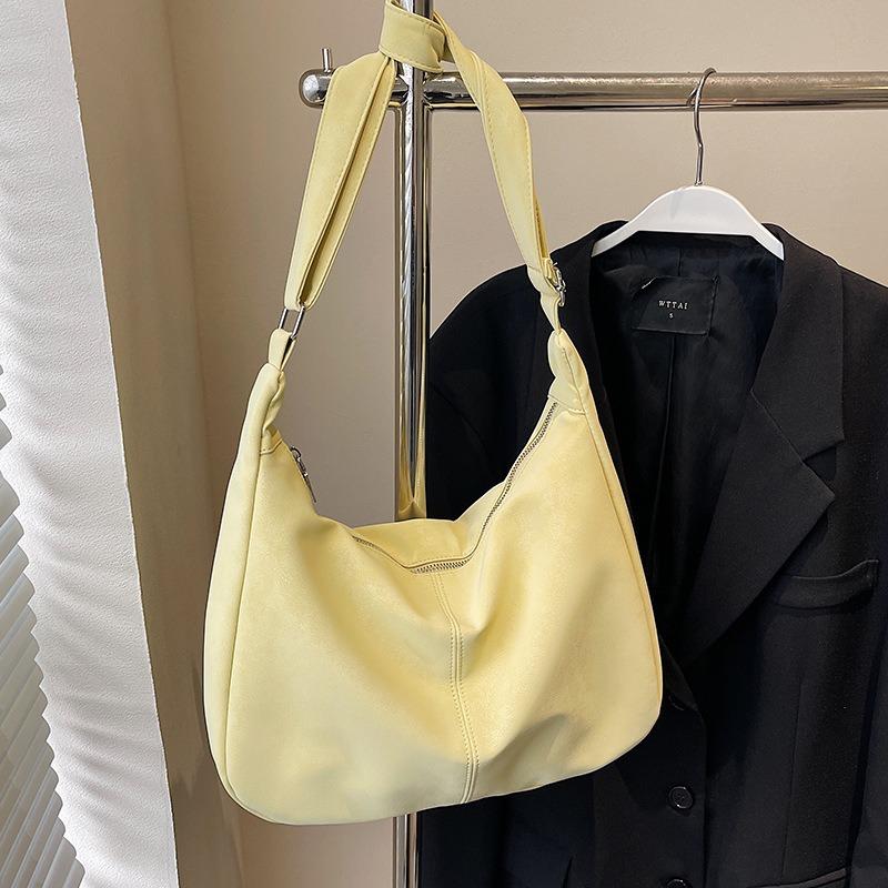 Niche cream soft waxy tote bag casual versatile student commuting large-capacity messenger bag woman