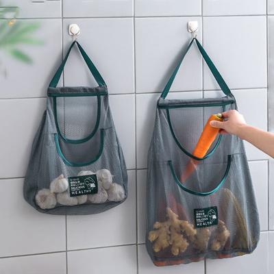 A Wall-mounted Breathable Storage Bag for FruitsVegetables Ginger and GarlicA Portable Kitchen Storage Bag