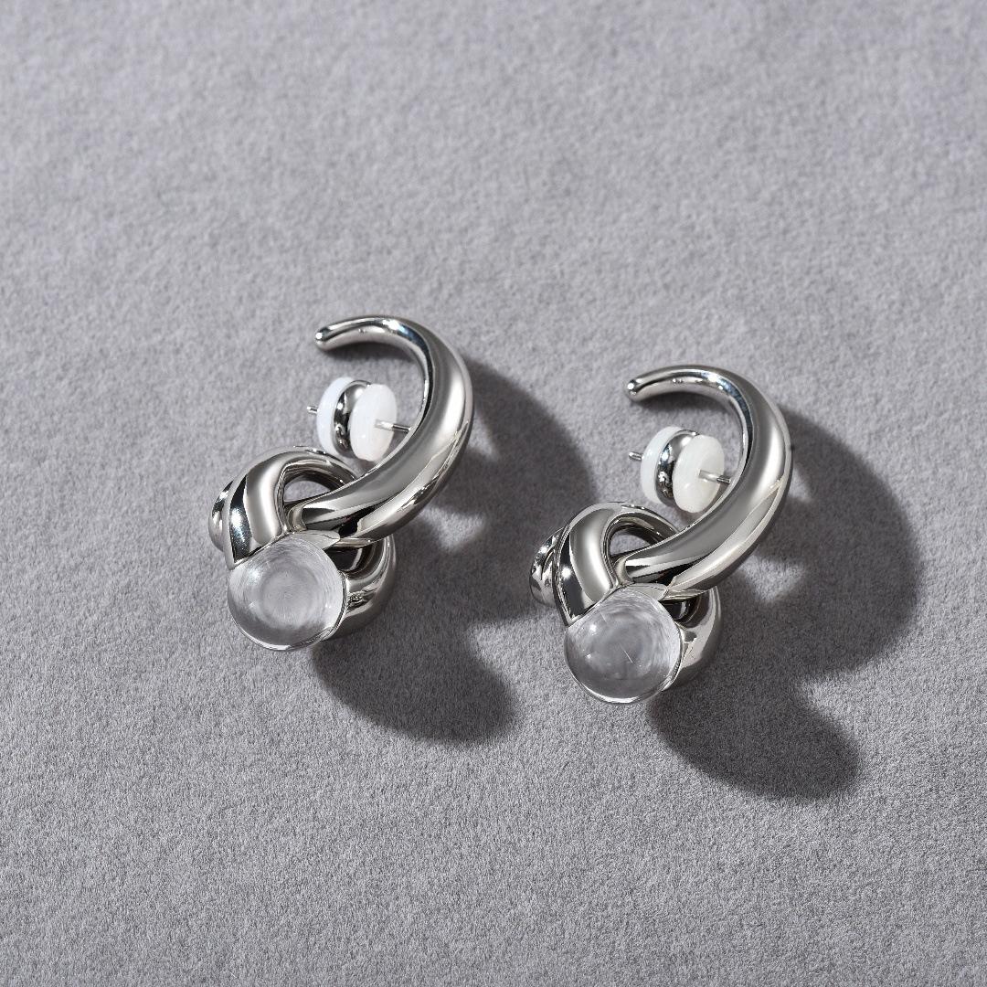 

Niche High-End Silver Metal Personality Temperament Simple Water Drop Crystal Pendant Earrings S925 Silver Needle Stud Earrings