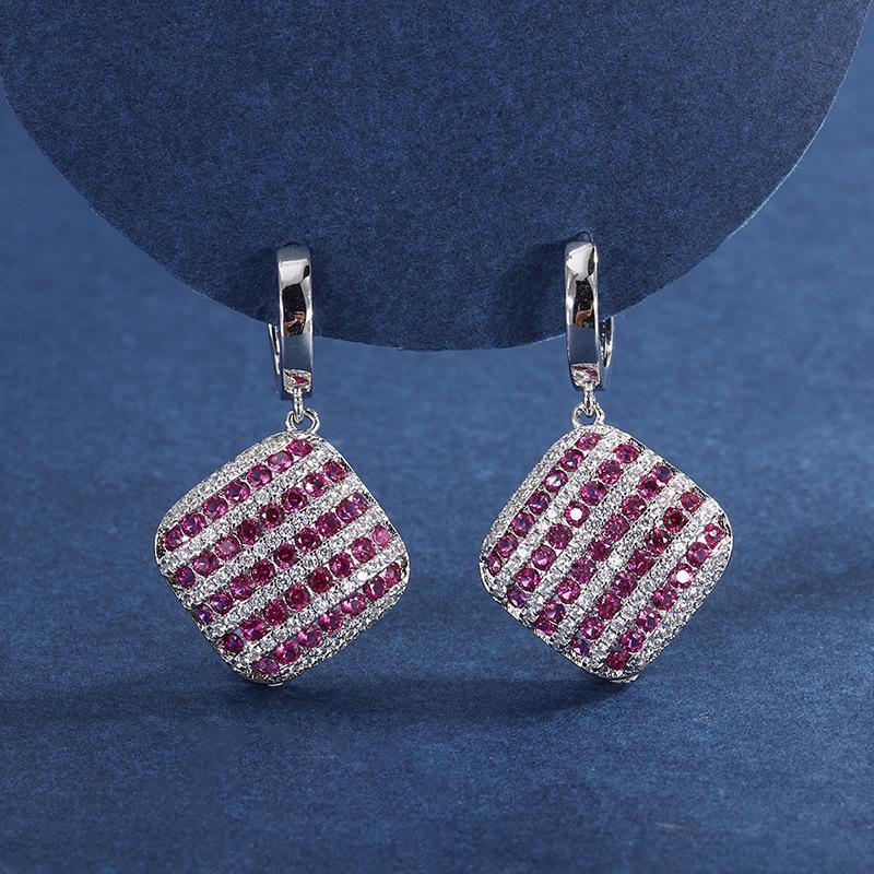 

Korean version of temperament women s earrings, colored treasure models, European and American stud earrings inlaid with simulated pigeon