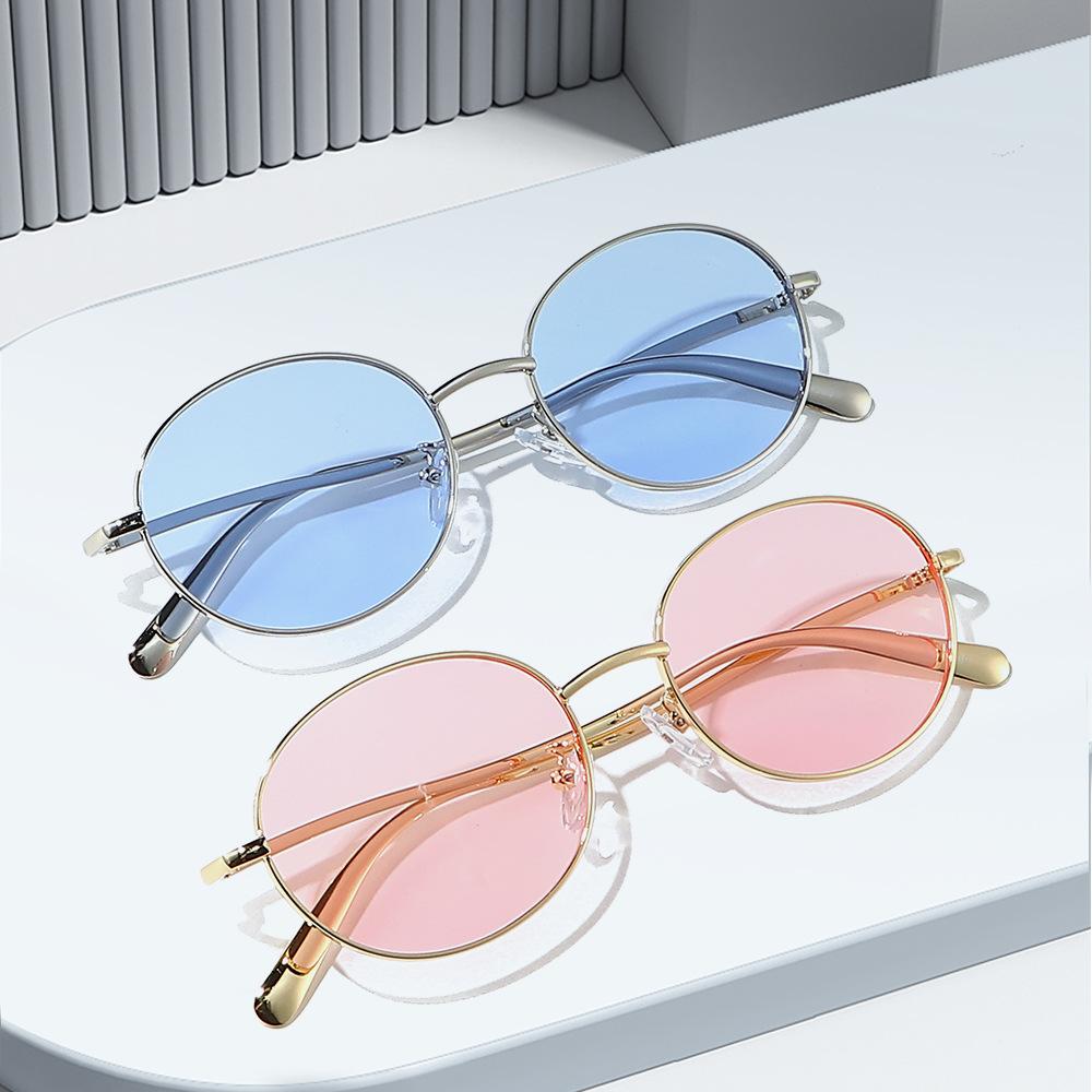 26 Metal-framed sunglasses, suitable for both men and women, offering UV protection