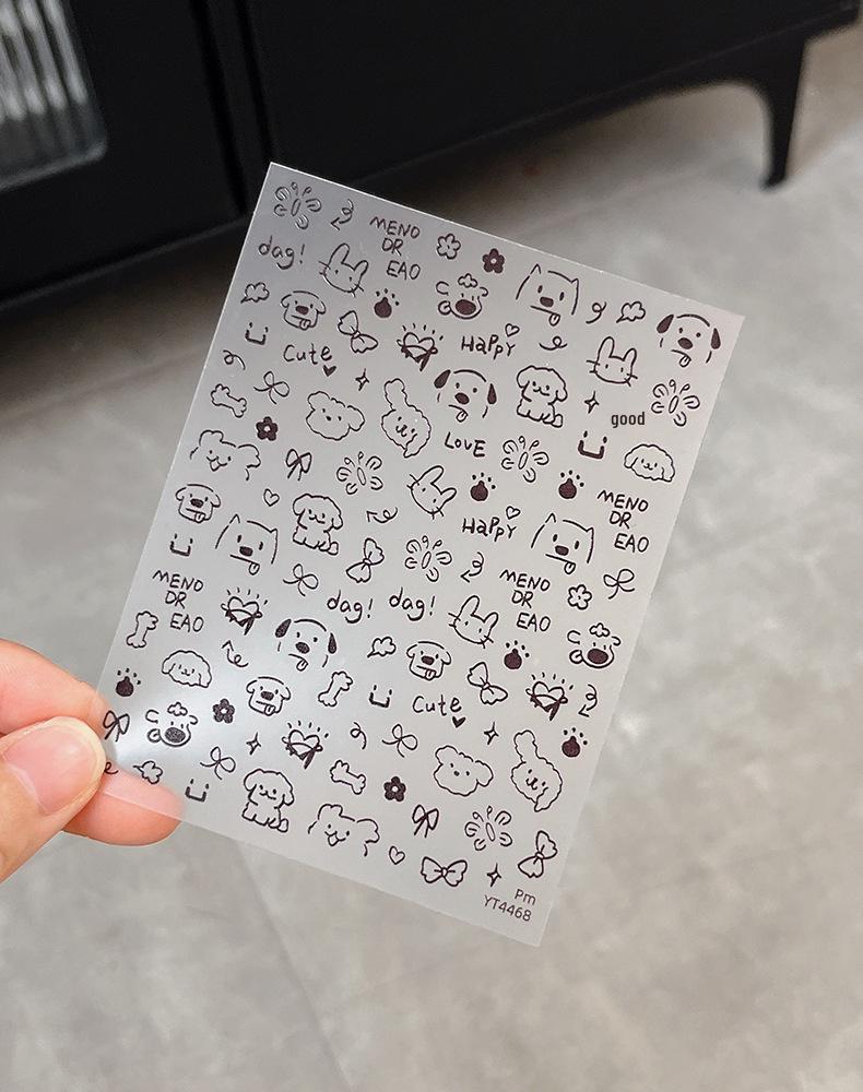 Adorable Cartoon Pet Nail Stickers: Black & White Puppy, Bow & Flower Graffiti Designs for DIY Nail Art