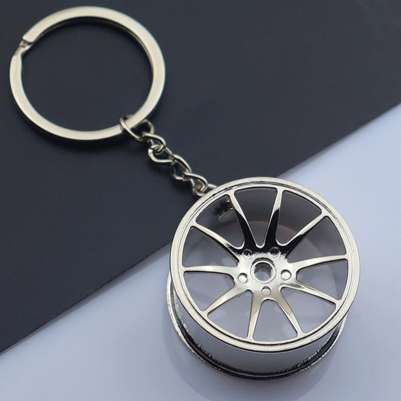 Gold Silver Black Car Wheel Keychain with Laser Logo: A Stylish Metal Accessory