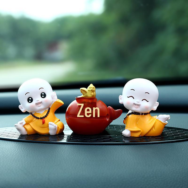 Creative Little Monk Maitreya Buddha Car Ornament: Cute, Shaking Head Resin Doll for Car Interior Decoration and Safety.