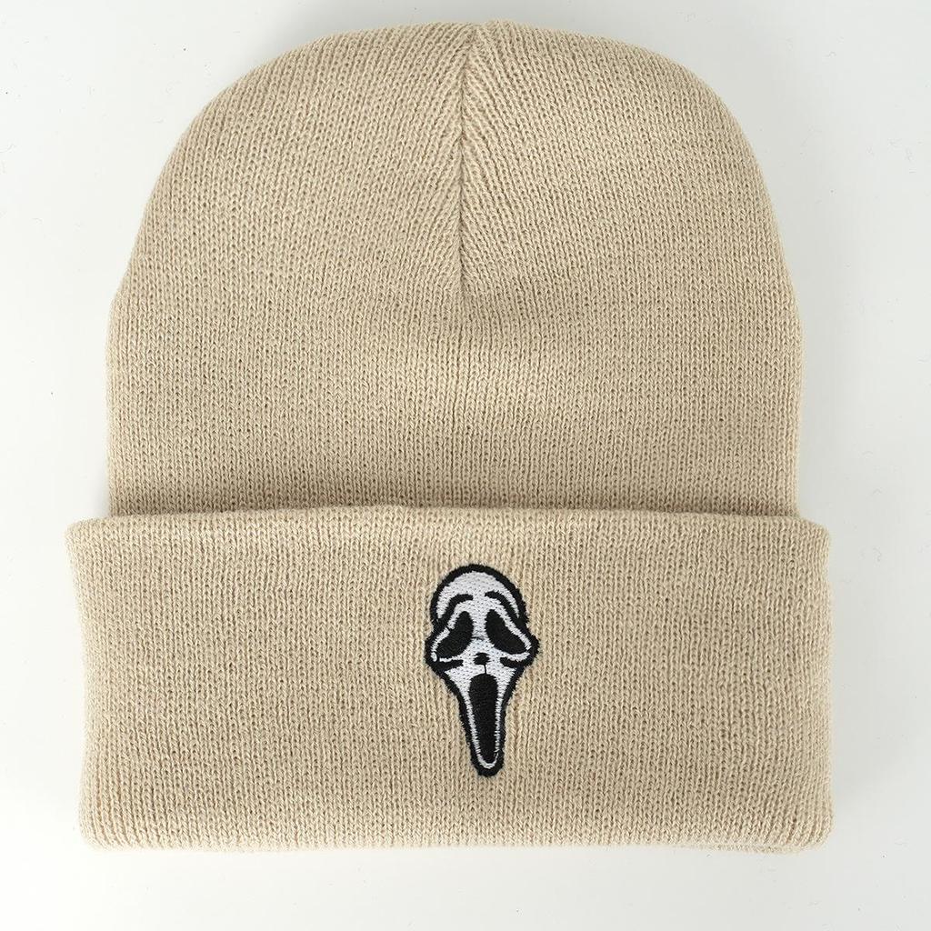 Unisex Trendy Knit Hat with Embroidered Skull Design for Street, Climbing, and Travel.