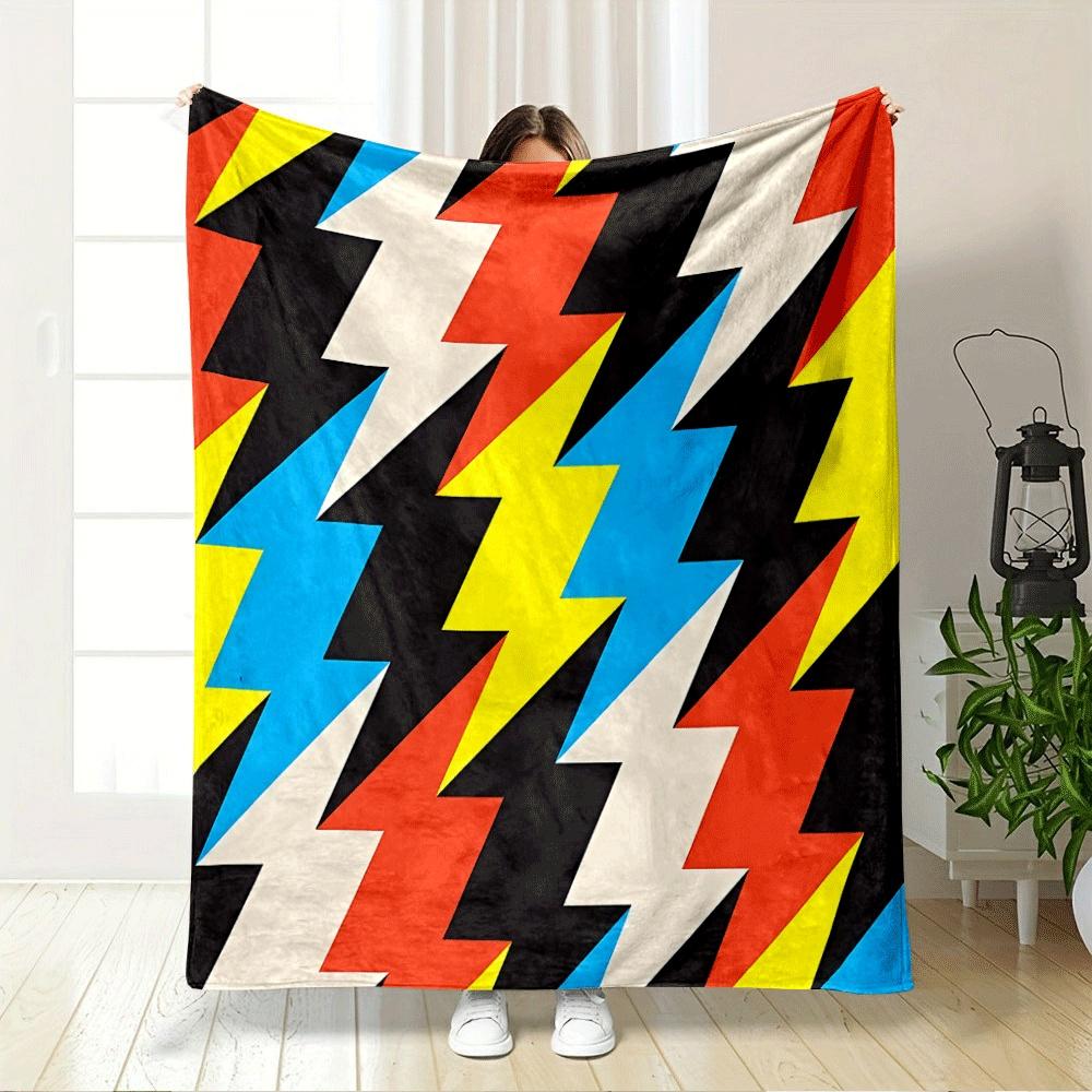 Zigzag lightning shapes in bold colors, including red, yellow, blue, and black. for all seasons blanket lunch break throw gift