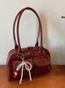 Simple and casual bow tie armpit bag for ladies, new Korean versi for 2026; fashiable and versatile single shoulder bag.