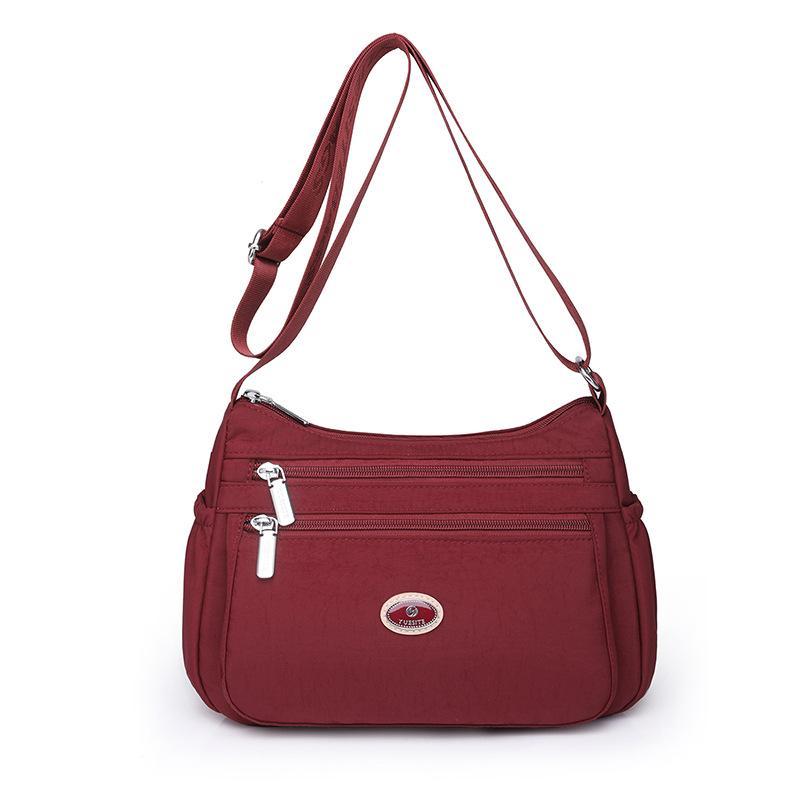 Bag 2025 new shoulder messenger bag nylon bag casual dumpling bag women's bag trend light luxury