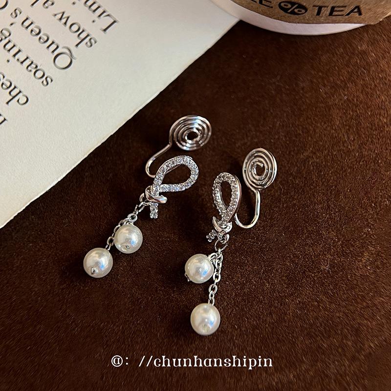 Pearl ear clips, women s French high-end bow, zircon stud earrings, unique temperament, mosquito coil disc, no ear piercings, earrings.