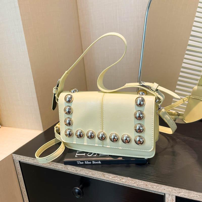 Versatile Locomotive Wind Messenger Bag Women's New Rivet Niche Design Sense Single Shoulder Armpit Small Square Bag