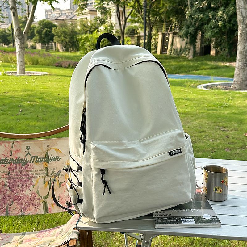 Large capacity schoolbag male high school students college students Japanese travel backpack female junior high school students computer backpack tide