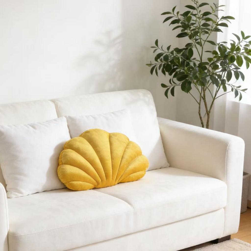 A seashell-shaped pillow, suitable for living room sofas, bedrooms, offices, and home decor.