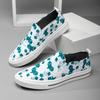 Nya sommar andningsbara canvas skor herrars trend mångsidiga brädskor is siden tygskor låga små vita skor tygskor