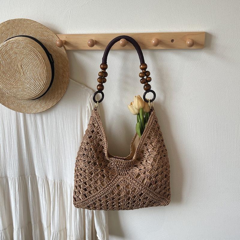 

Вязаная соломенная сумка большой вместимости женская летняя новая нишевый дизайн на плечо приморский отпуск пляжная сумка коричневый