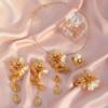 Exquisite 4-Piece Tassel Jewelry Set: Hollow Flower Necklace, Earrings, Bracelet & Ring
