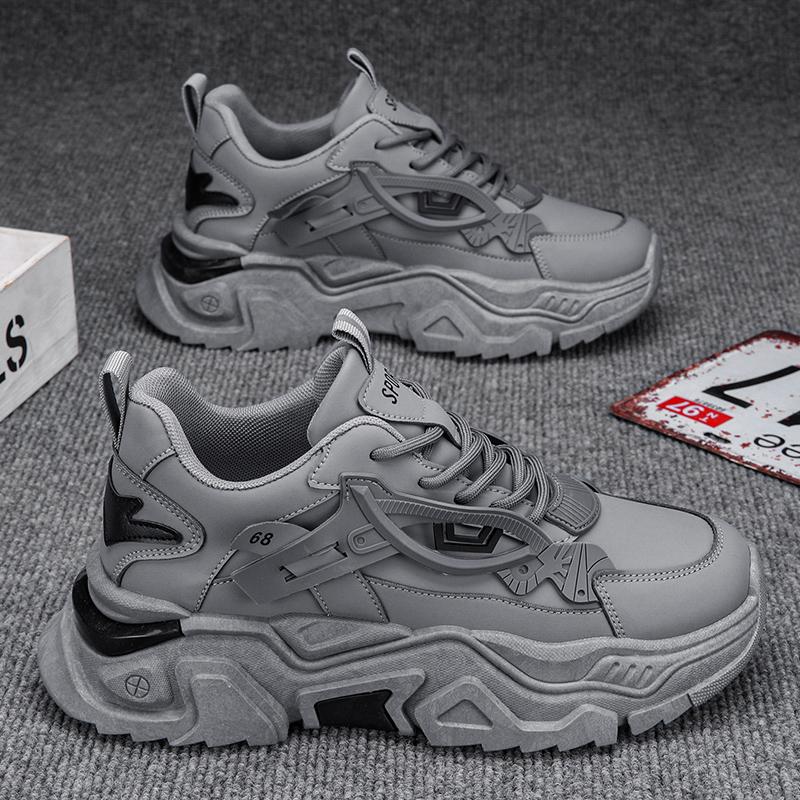 

Нове чоловіче модне повсякденне спортивне взуття на низькому ходу. Студентські зручні кросівки на товстій підошві. Чоловічі класичні дихаючі баскетбольні кросівки. 45 сірий
