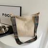 Retro commuter large-capacity bag women's winter new simple casual bucket bag niche fashion shoulder bag