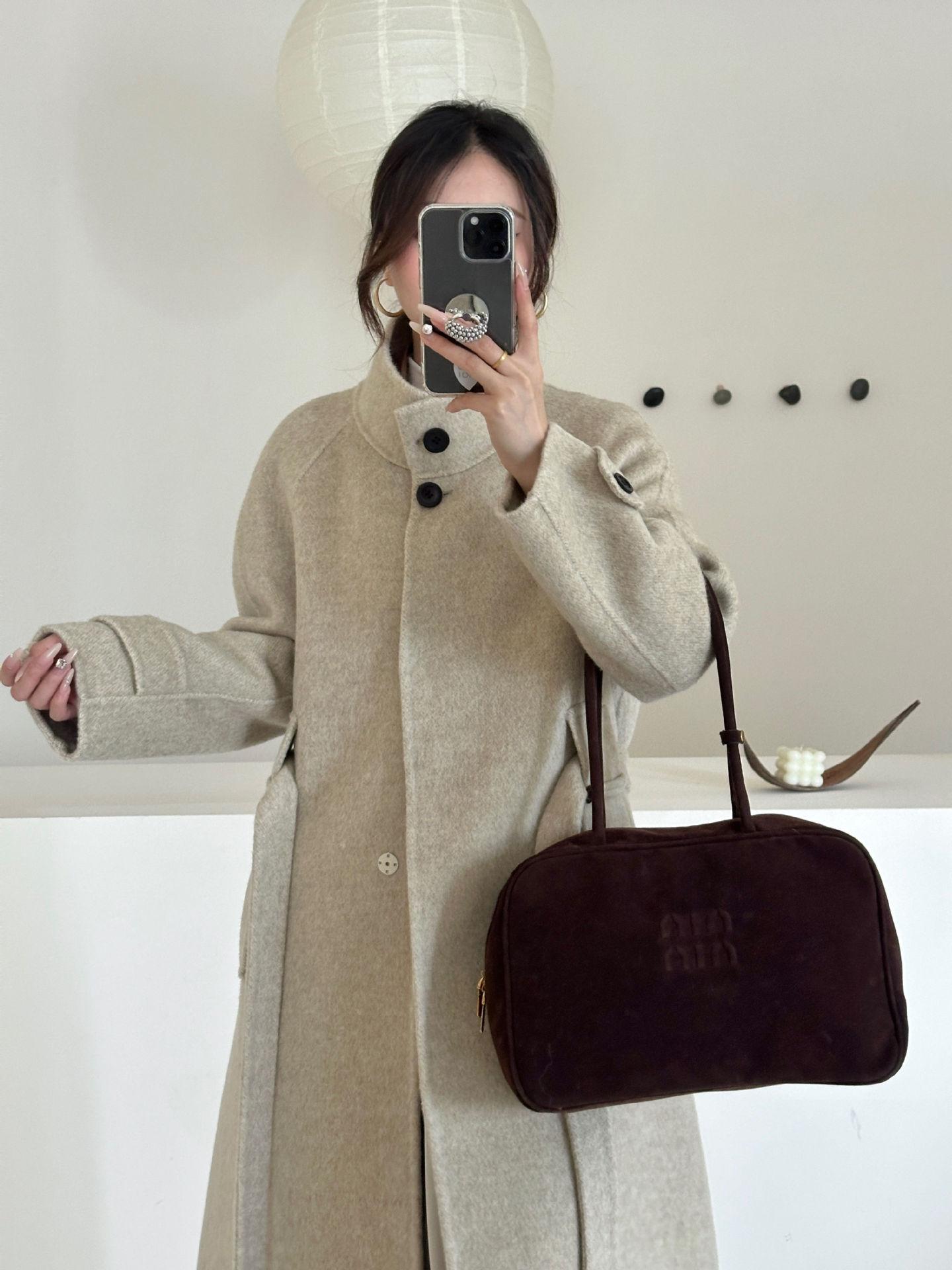 

Шерстяное пальто однотонное воротник-стойка рукав-плечо на шнуровке однобортное длинный рукав удлиненное шерстяное пальто женское осенне-зимнее M