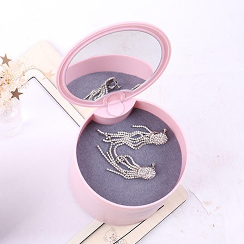 Tragbare Schmuckschatulle Reise-Schmuckkoffer 4-lagiger drehbarer Ohrring-Aufbewahrungsorganizer mit Spiegel Rosa